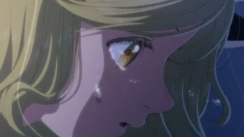 Official Witch Hat Atelier episode 1 still showing Coco in an emotional close-up